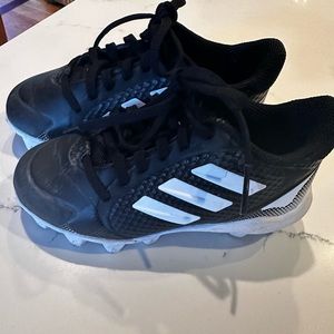 Black adidas toddler baseball/tball cleats. Size 11.